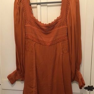 Free People short romper silky burnt Orange size 10 NWOT